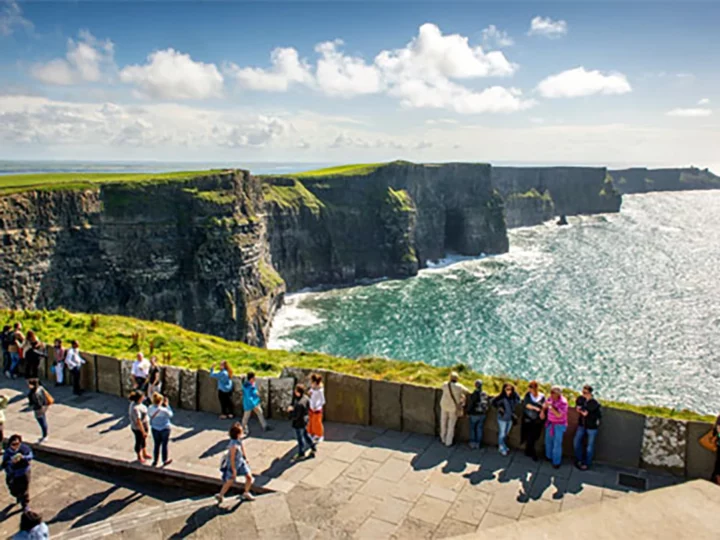 People overlooking cliffs