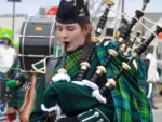 Woman playing bagpipes