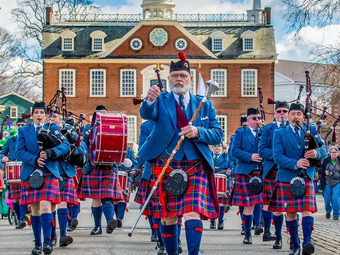People in kilts marching in Newport Rhode Island Saint Patrick's Day Parade