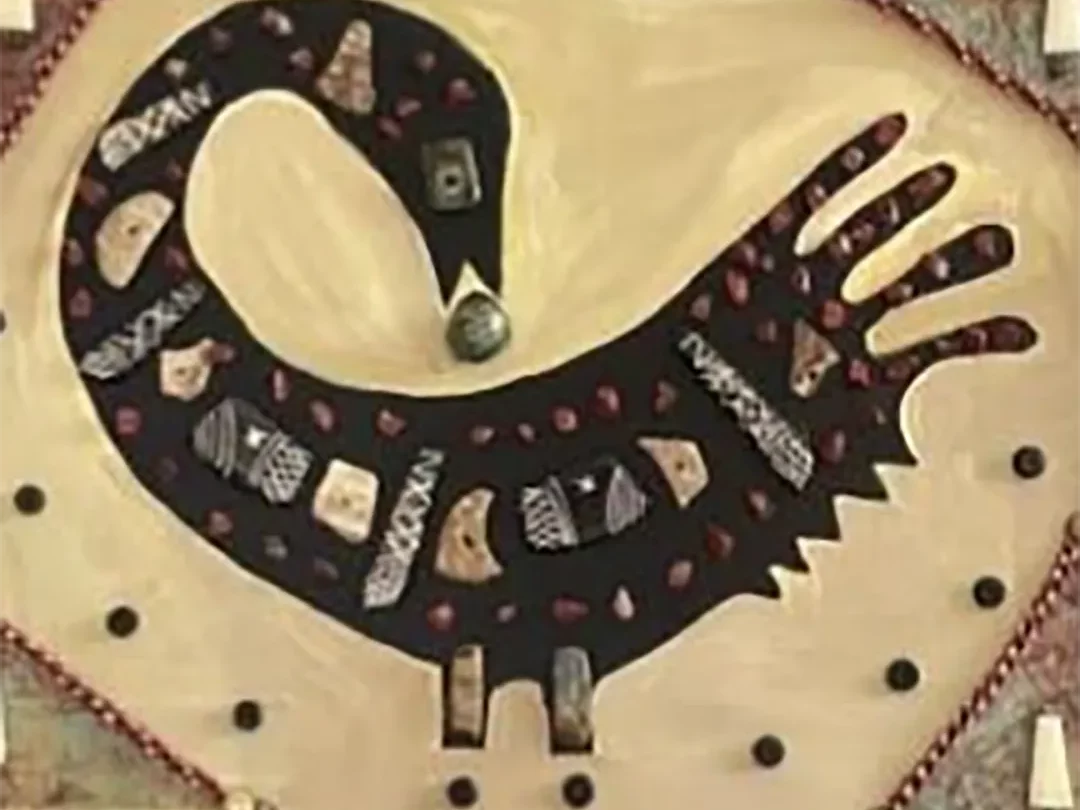 image of African mosaic art of a bird with a pebble in its mouth