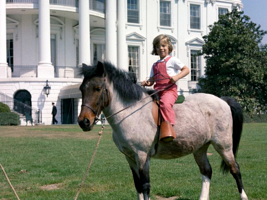 Caroline Kennedy with Macaroni the pony